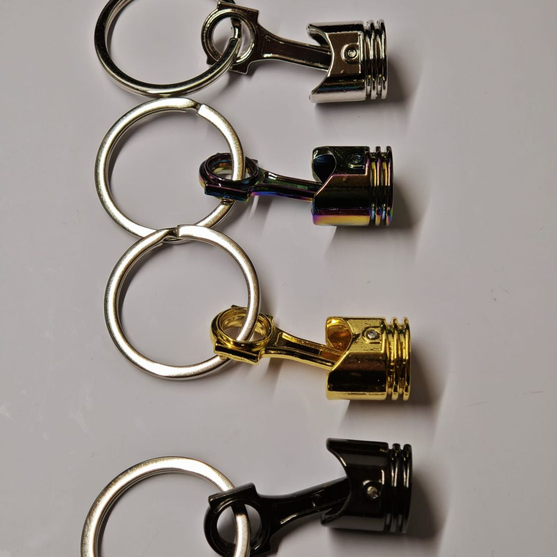 Schlüsselanhänger Kolben Metall